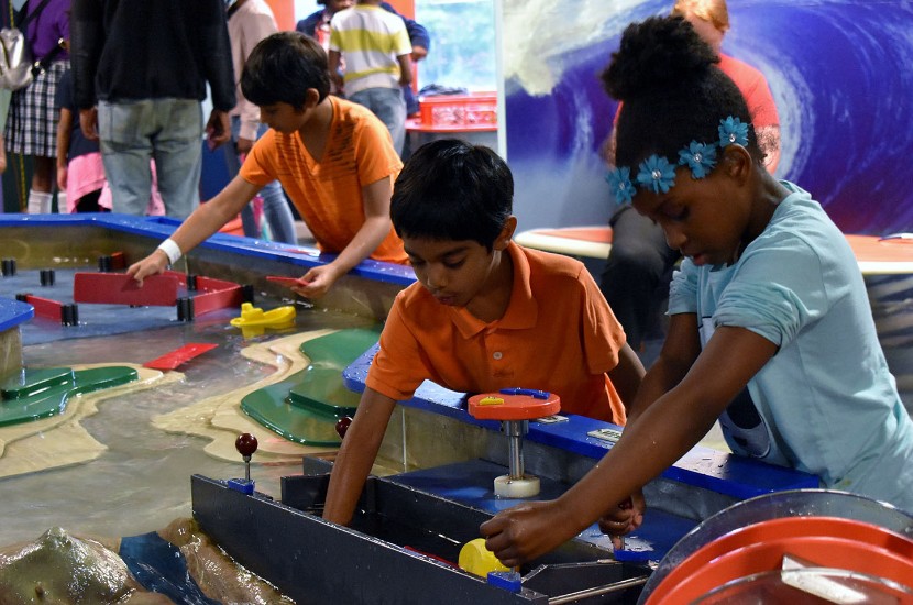 Children playing together in Port Discovery's Wonders of Water exhibit